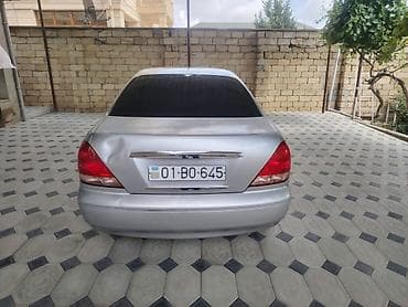 Nissan Sunny: 1.3 л | 2006 г. Седан — 9