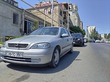 Nəqliyyat: Opel Astra: 1.8 l | 1999 il 554000 km Universal — 7