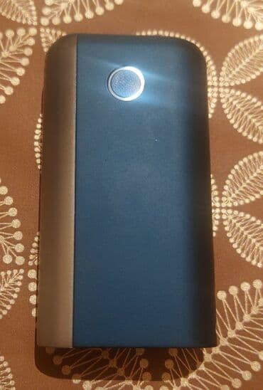 işlənmiş qızıllar: Glo cihazı göy rəngdədir. Cihaz tütün qızdırmaq üçün nəzərdə tutulub — 1