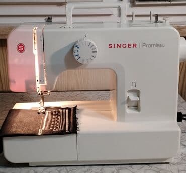 petlə maşını: Singer tikiş maşını duz zigzag və sair tikis funksiyasi var duymə yeri — 1