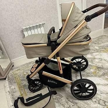 Uşaq geyimi və ayaqqabıları: Çıxarıla bilən beşikli araba, Kidilo — 1