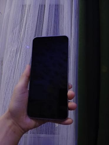 redmi buds 6 active: Smartfon – boz/gümüşü rəng, düz kənarlı korpus, mat arxa panel. - Arxa — 2