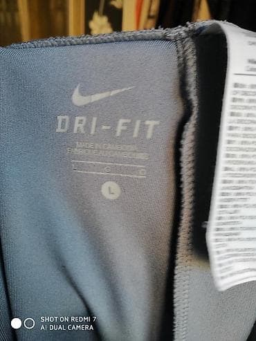 erato: Спортивные брюки новые Nike с вентиляционными отверствиЯми сбоку — 6