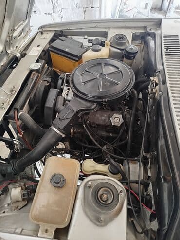 sarı tofas: Model: Tofas Şahin (sedan) Kuzov: 4 qapı, gümüşü rəng, qara bamperlər — 10