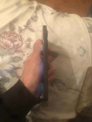 Redmi smartfon - Rəng: qara, mat arxa panel - Ekran: tam ekran ön lalafo.az -da Redmi smartfon - Rəng: qara, mat arxa panel - Ekran: tam ekran ön