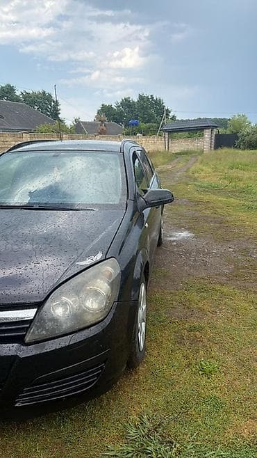 kia optima 2 sade mator: Opel Astra: 1.3 l | 2006 il Universal — 2
