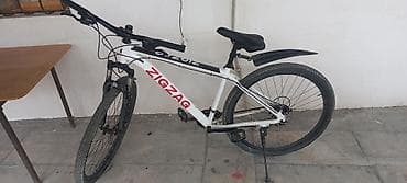 ZIGZAG marka dağ velosipedi - Rəng: ağ/qara, gövdədə “ZIGZAG” yazısı