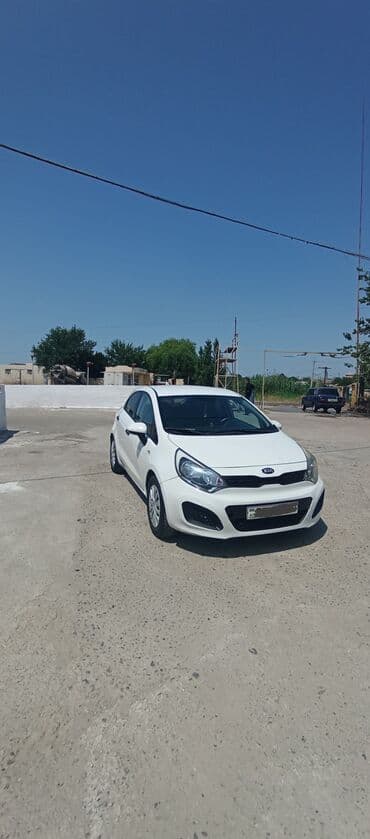 saipa satis merkezi: Kia Rio: 1.2 л | 2012 г. Хэтчбэк — 1