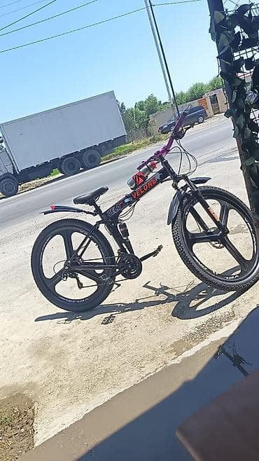 velosiped ural: Velosiped – dağ/şosse üçün universal model Xüsusiyyətlər: - Qatlanan — 1