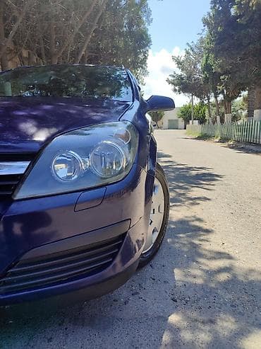 13 disk: Opel Astra Caravan (Universal) – mavi rəng - Kuzov: universal — 3