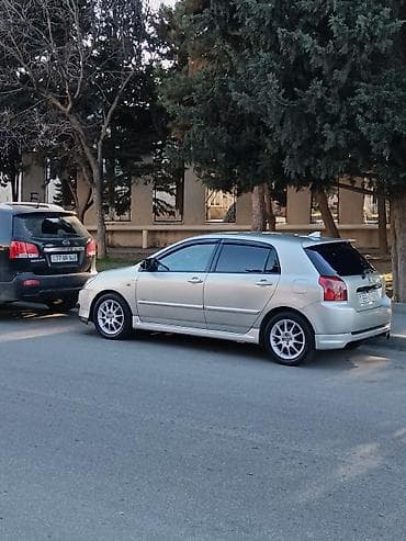 disk lider: Toyota Corolla (E120) Hatchback – D-4D dizel - Kuzov: 5 qapılı — 1