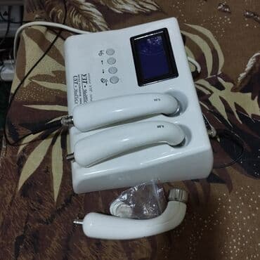 fizioterapiya aparati: Ağ rəngli, MedTeKo markalı ultrasəs terapiya cihazı. Cihaz kosmetik — 3
