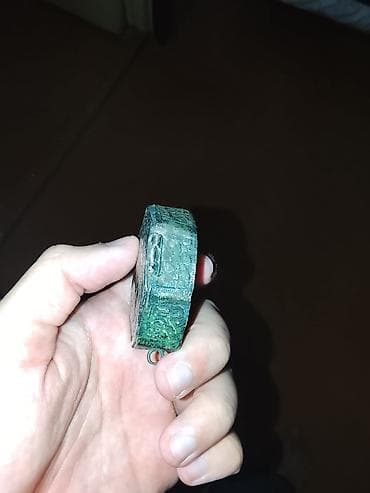 Dini kitablar: 1 əsrdən çox yaşı olan miniatür "Quran". Futulyarı gümüşdür. Təqribi — 4