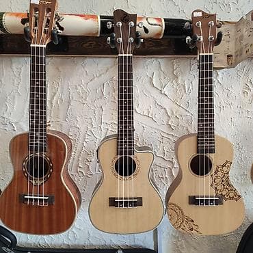 gitara çexolu: Elektro ukulele Smiger GUC-500C Material:Şam ağacı İstehsalşı:Çin — 1