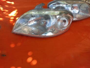 elentra fara: Komplekt, Yaxın və uzaq vuran işıqlar Chevrolet, 2011 il, Orijinal, ABŞ, İşlənmiş — 2