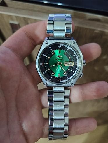 Смарт часы: Б/у, Наручные часы, Orient, цвет - Зеленый — 1