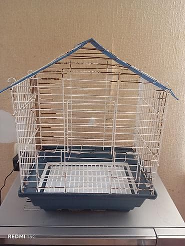Quş qəfəsi – ev formalı damlı model - Material: metal barmaqlıqlar
