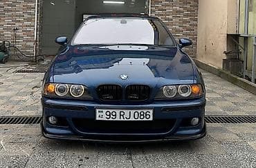 BMW 5 Series E39 sedan, mavi rəng. - Kuzov: 4 qapı, aerodinamik M-stil