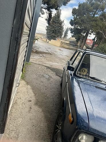Avtomobil alışı: VAZ 2106, mavi rəng, sedan kuzov. - Salon: qara rəngli oturacaqlar — 4
