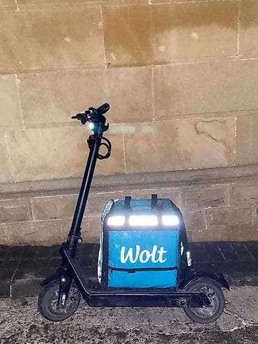 sur: Elektrik skuter + Wolt termobağlaması Məhsulun təsviri: - Şəhər içi — 7