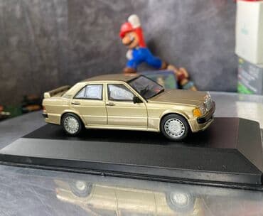 metbex tavan modelleri: Коллекционная модель Mercedes-Benz 190E 2.3 16V W201 gold 1984 EDICOLA — 3