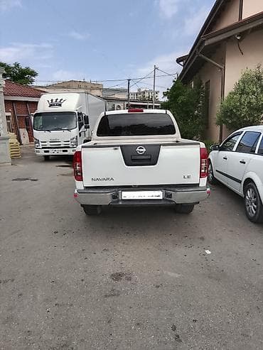 kompressor teh: Nissan Navara: 2.5 l | 2013 il Pikap — 5