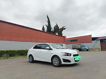 opel astra f 1997: Chevrolet Aveo: 1.4 l | 2011 il Sedan — 4