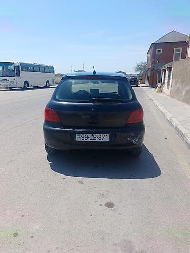 prius duman: Peugeot 307, qara rəng, hetçbek kuzov. Texniki və dizayn — 4