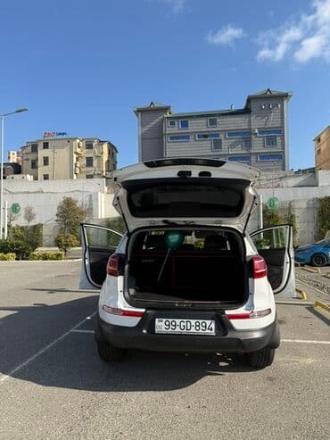 фольксваген тигуан 1 4: Kia Sportage: 2 л | 2010 г. Кроссовер — 3