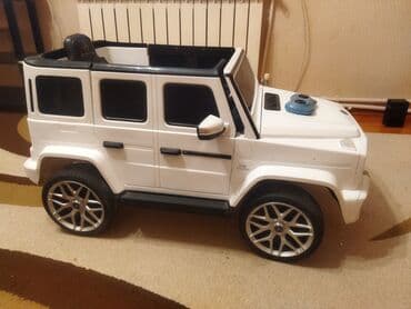 işlənmiş uşaq masinlari: Ağ rəngdə, Mercedes-Benz AMG G63 modelinə bənzər uşaq elektrik — 6