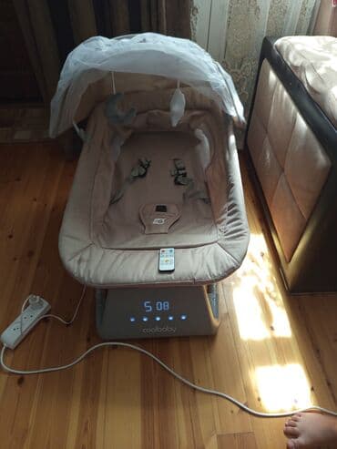 uşaq yellənçəyi: Coolbaby markalı elektrik uşaq yelləncəyi, ağ rəngdədir. Bu — 4
