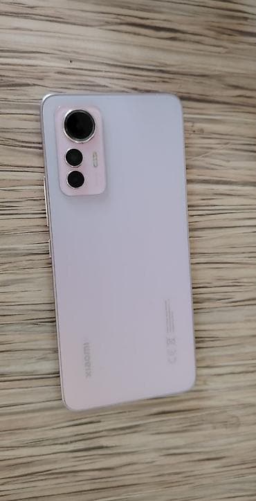Xiaomi 12 Lite, 128 ГБ, цвет - Розовый, 
 Сенсорный, Отпечаток пальца, Беспроводная зарядка — 1