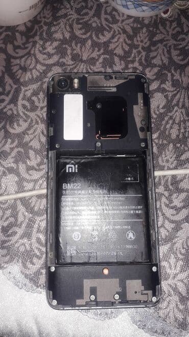 Apple iPhone: Xiaomi Mi 5, 
 Barmaq izi — 1
