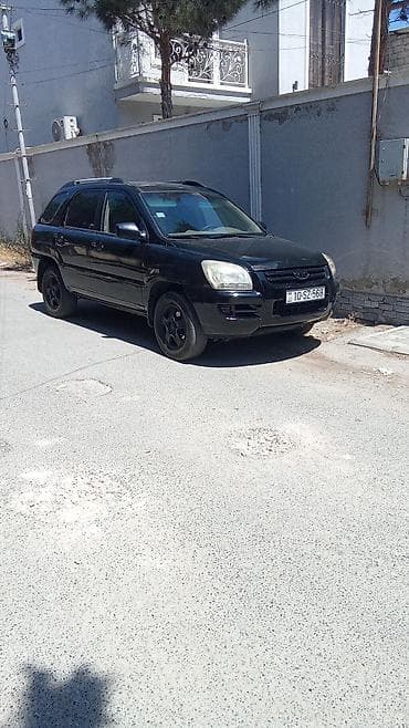 kia k3: Kia Sportage: 2 l | 2006 il Ofrouder/SUV — 2