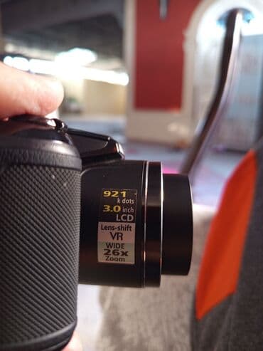 yemek bisiren aparat: Nikon brendinə məxsus qara rəngli fotoaparat, istifadəçilər üçün rahat — 5