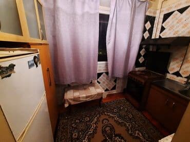 məhəmmədi kirayə: Həzi Aslanov metrosunun poctun binalarinda 9 mertebeli binanın 5-ci — 4