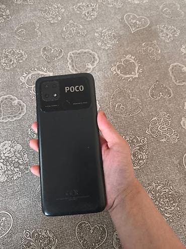 redimi 9 a: Poco C40, 64 GB, rəng - Qara, Barmaq izi — 4