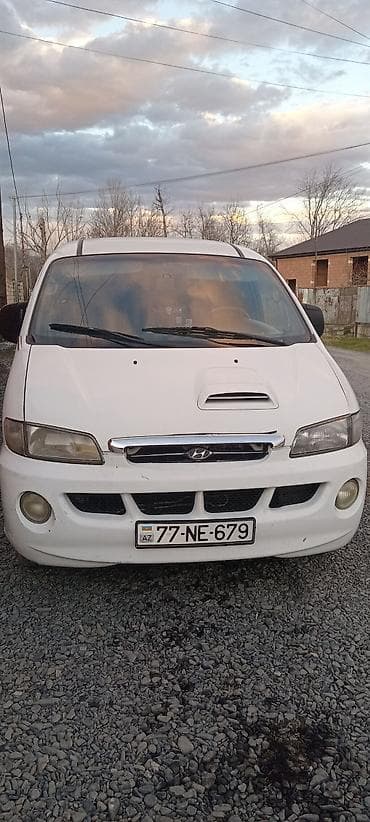 opel astra xecbek: Hyundai H-1/Starex mikroavtobus – ağ rəng, 77-NE-679 dövlət nömrə — 1