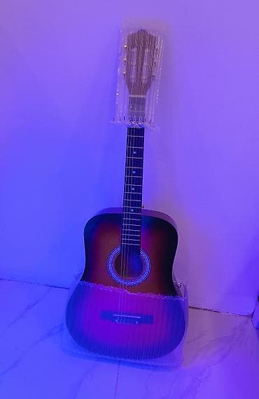 Klassik gitara hədiyyə alnıb işlənmiyib karobkası çxolu var