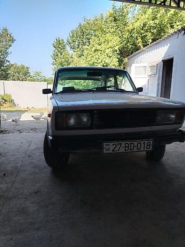 starter vaz: VAZ 2107 sedan - Kuzov: 4 qapılı, klassik kuzov forması, ağ rəng. Ön — 2