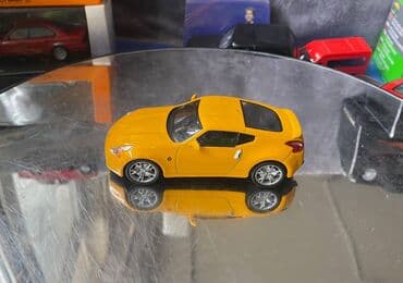 metbex tavan modelleri: Коллекционная модель Nissan 370Z Z34 yellow 2008 DeAgostini Scale — 9