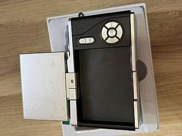 Foto və videokameralar: Rəqəmsal foto/video kamera – çevrilə bilən ekranlı - Lens: F=5.0 mm — 2