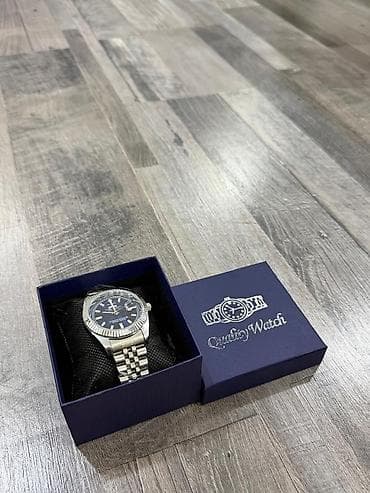 Metall kəmərli kişi qol saatı – Rolex Watch” qutusunda. Maya deyerine — 1