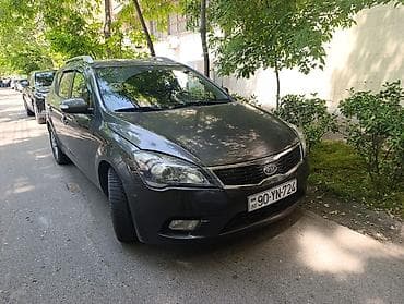pulsuz ehtiyacı olan: Kia Cee’d SW (universal) – tünd boz rəng, 5 qapılı, dam relsləri ilə — 1