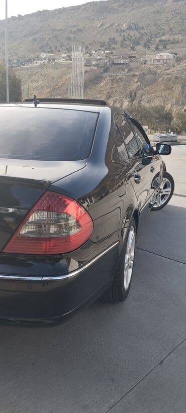 bmw 7 серия 725tds at: Mercedes-Benz E 220: 2.2 l | 2007 il Sedan — 27