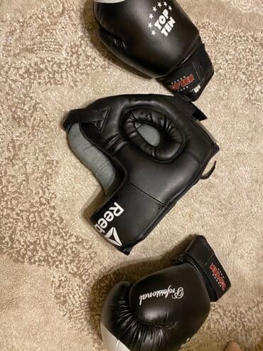 Qaçış trenajorları: Boks üçün dəst: - 1 cüt qara boks əlcəyi – “TOP TEN” bilək bandajlı — 3