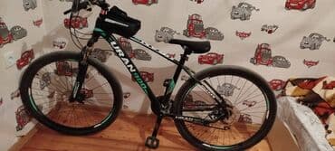 сколько стоит электровелосипед: 29luq velosiped URAN900 8skorus Üzərində telefon ucun kaslok var və — 1