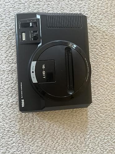 ps3 oyun disk: SEGA Mega Drive 16-bit oyun konsolu seti Paketə daxildir: - SEGA Mega — 1