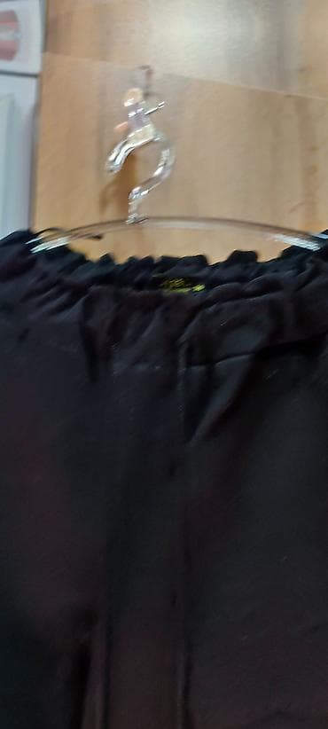 Брюки: Qara rəngli şalvar, 46-48 ölçüyə uyğundur. Türk malıdır. Çox gözəl — 2