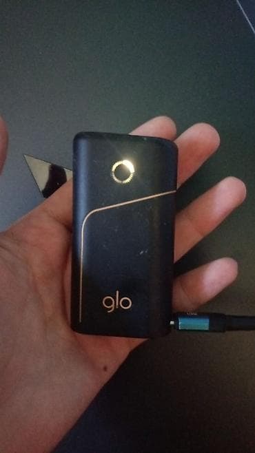Glo tütün qızdırma cihazı - Rəng: qara, qızılı xətt və logo detalları